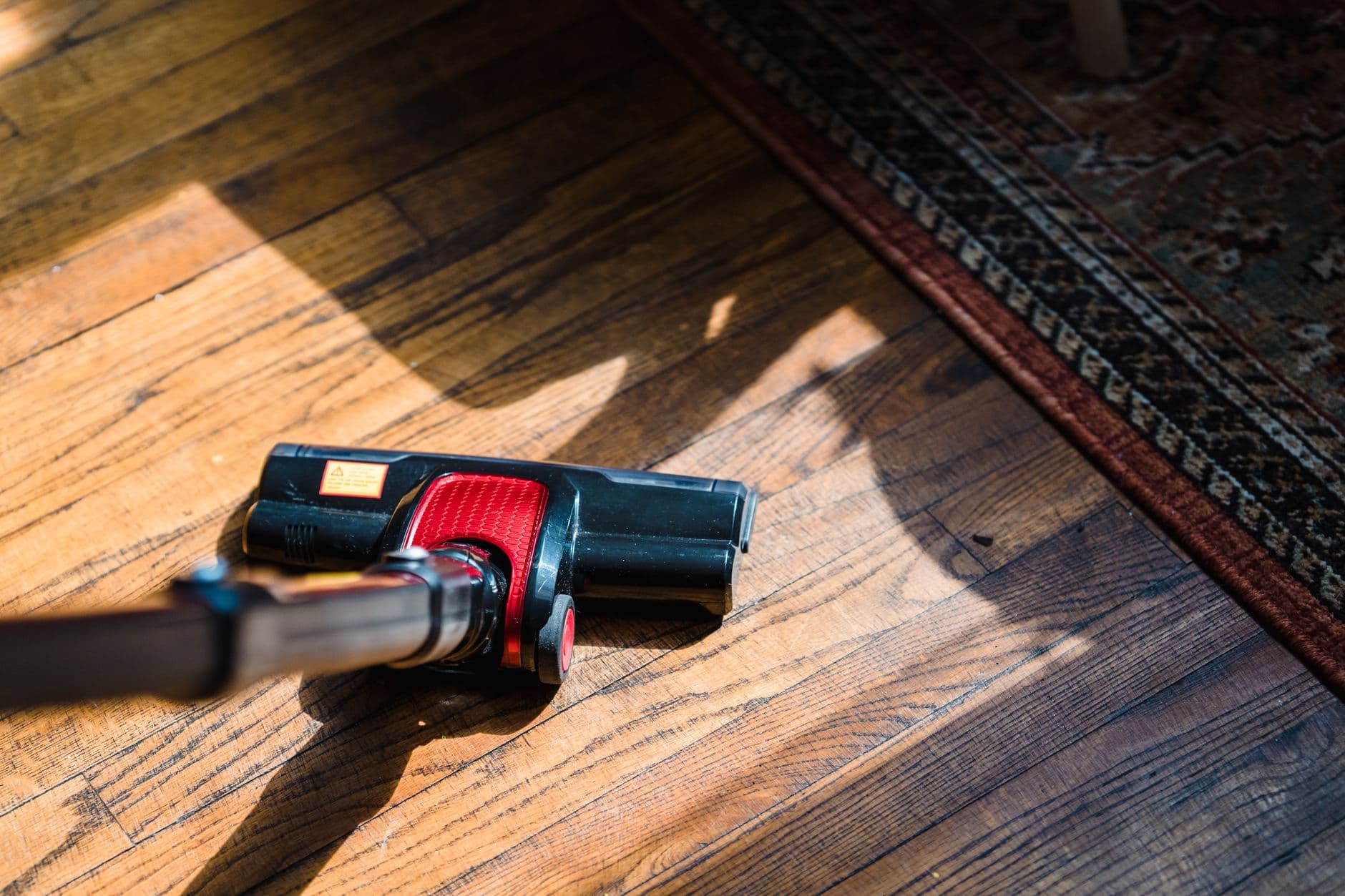 vacuuming living room carpet